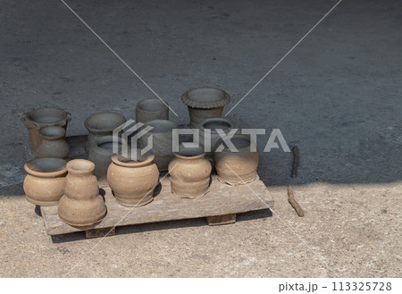 An empty of freshly made clay Pots. An empty of freshly made clay Pots. 113325728