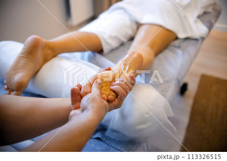 Unwinding with a Relaxing Leg Massage Unwinding with a Relaxing Leg Massage 113326515