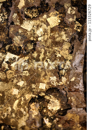 Close Up Of Gild Texture On Gold Wood Buddha Statue Background. 113326729