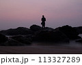 fishermen on the rock ocean 113327289