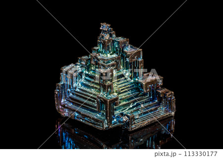 Macro of the stone bismuth mineral on a black background 113330177
