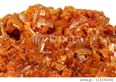 Macro stone mineral Wulfenite on a white background 113330298
