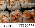 Art of Sushi: A Culinary Journey, a variety of sushi rolls, including maki and nigiri, the fresh ingredients, crisp rice paper, and glistening sauce 113330776