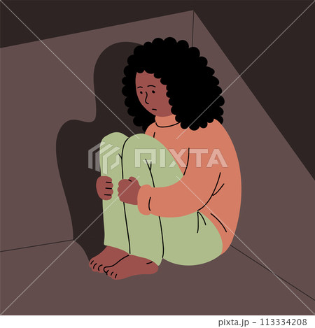Sad young woman in the corner 113334208