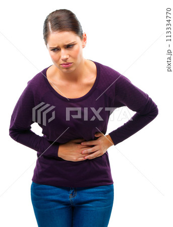 Stress, anxiety and woman with stomach pain in studio for gas, constipation or pms crisis on white background. Menstruation, cramps or female model with gut health problem, virus or endometriosis Stress, anxiety and woman with stomach pain in studio for gas, constipation or pms crisis on white background. Menstruation, cramps or female model with gut health problem, virus or endometriosis 113334770