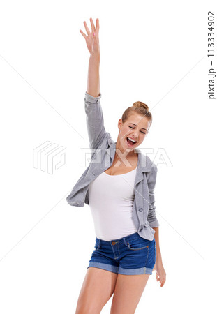 Excited winner, cheering or woman in studio isolated of news, announcement or bonus prize. Energy, smile or happy female person in celebration of fashion discount, success or sale on white background Excited winner, cheering or woman in studio isolated of news, announcement or bonus prize. Energy, smile or happy female person in celebration of fashion discount, success or sale on white background 113334902