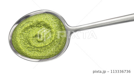 Broccoli cream soup in spoon isolated on white background. Top view Broccoli cream soup in spoon isolated on white background. Top view 113336736