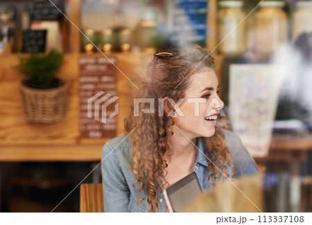 Coffee shop, relax and woman in window with laptop for internet, social networking and website. Happy, smile and person on computer in restaurant, cafe and diner for caffeine, beverage and cappuccino Coffee shop, relax and woman in window with laptop for internet, social networking and website. Happy, smile and person on computer in restaurant, cafe and diner for caffeine, beverage and cappuccino 113337108