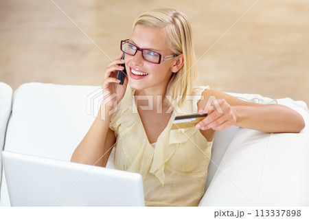 Phone call, couch and woman with laptop, credit card and online shopping payment in home. Ecommerce, crm and girl on sofa with cellphone discussion for deal, offer or internet sale in living room. Phone call, couch and woman with laptop, credit card and online shopping payment in home. Ecommerce, crm and girl on sofa with cellphone discussion for deal, offer or internet sale in living room. 113337898