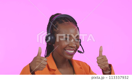 Business woman, call center and thumbs up for communication, happy sales and customer service on pink background. Portrait of African consultant or agent, yes and like emoji for contact us in studio Business woman, call center and thumbs up for communication, happy sales and customer service on pink background. Portrait of African consultant or agent, yes and like emoji for contact us in studio 113337932