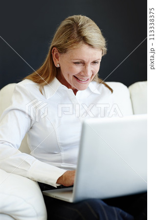 Mature businesswoman, website and laptop on couch, planning and internet for b2b online communication. Female person, CEO and proud of startup company, finance and happy accountant for ideas on app 113338375