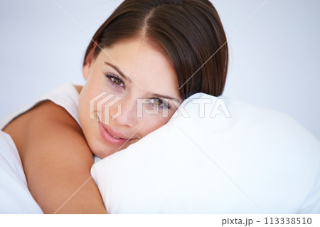 Portrait, pillow and bedroom with woman, relax and resting with weekend break, lazy and wellness. Face, person and apartment with girl, home and peace with smile, cushion and calm with health Portrait, pillow and bedroom with woman, relax and resting with weekend break, lazy and wellness. Face, person and apartment with girl, home and peace with smile, cushion and calm with health 113338510