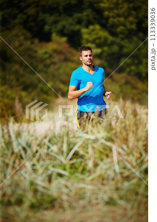 Sporty, man and running in nature for fitness, health and wellness in outdoor for workout or exercise. Male person, training and cardio with endurance, muscles and strength for healthy living or gym Sporty, man and running in nature for fitness, health and wellness in outdoor for workout or exercise. Male person, training and cardio with endurance, muscles and strength for healthy living or gym 113339036