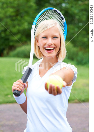 Ball, portrait or happy woman ready for tennis training, exercise or game with a racket outdoors. Smile, healthy start or excited girl athlete giving an offer for sports, wellness or fitness workout 113339548