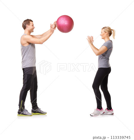 Fitness, man and woman with gym ball with coaching in exercise, body wellness and support. Sports workout, girl and personal trainer with sphere for balance, training and power on white background. 113339745
