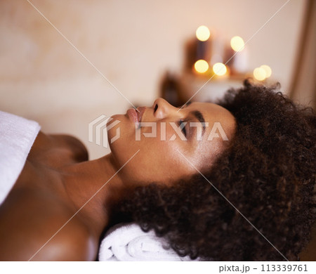 Woman, relax and wellness in spa for beauty, care and cosmetic treatment for break or peace. African person and natural for holistic therapy for skincare, clean and hygiene with towel for rest Woman, relax and wellness in spa for beauty, care and cosmetic treatment for break or peace. African person and natural for holistic therapy for skincare, clean and hygiene with towel for rest 113339761