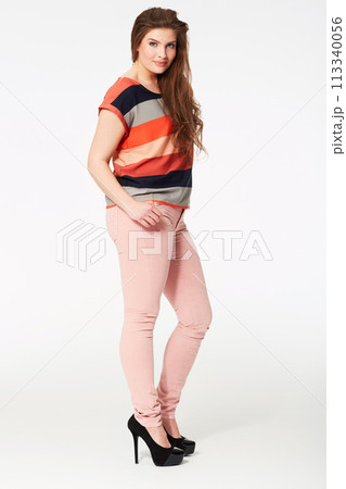 Happy woman, portrait and fashion clothing in beauty or style against a white studio background. Face of attractive young female person or model smile with casual outfit in high heels on mockup space 113340056