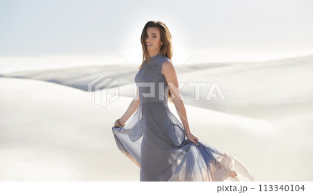 Portrait, desert and woman with holiday, fashion and weekend break with sand and getaway trip. Face, dress and girl with vacation and sunshine with travel and outdoor with nature and tropical island Portrait, desert and woman with holiday, fashion and weekend break with sand and getaway trip. Face, dress and girl with vacation and sunshine with travel and outdoor with nature and tropical island 113340104