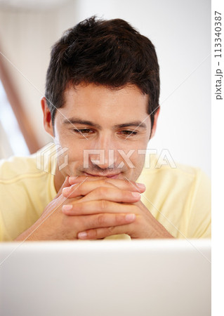 Man, laptop and online reading for business review as financial advisor for startup career, deal or connection. Male person, smile and good news email in office for entrepreneur, internet or research 113340387