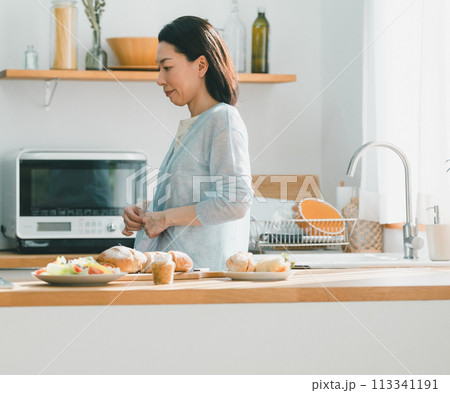 a forty-something woman a forty-something woman 113341191
