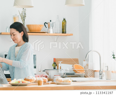 a forty-something woman a forty-something woman 113341197