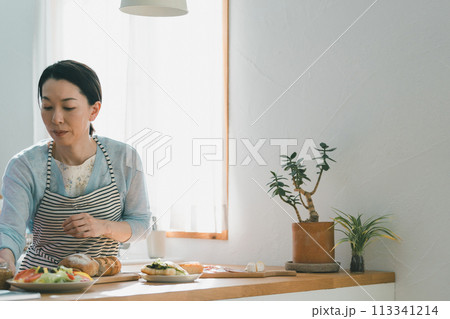 a forty-something woman a forty-something woman 113341214