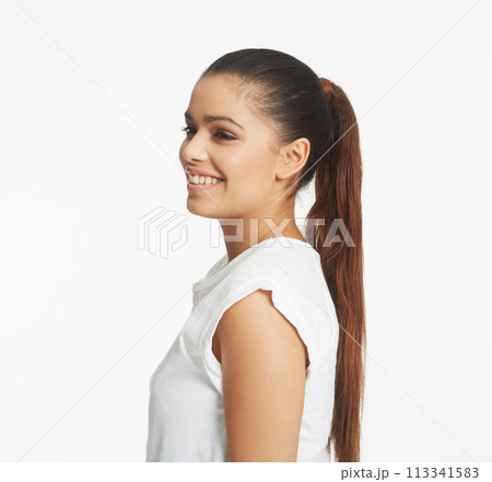 Woman, profile and smile with beauty in studio, shine and cosmetics with positive mood on white background. Happy, pride and Mexican model with ponytail, natural and clean for healthy skin with glow Woman, profile and smile with beauty in studio, shine and cosmetics with positive mood on white background. Happy, pride and Mexican model with ponytail, natural and clean for healthy skin with glow 113341583