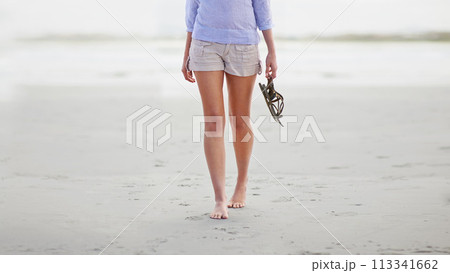 Legs, walking and beach relax for vacation for holiday weekend or tropical island, summer or wellness. Person, barefoot and sand at Florida ocean for explore adventure or peaceful, resting or calm Legs, walking and beach relax for vacation for holiday weekend or tropical island, summer or wellness. Person, barefoot and sand at Florida ocean for explore adventure or peaceful, resting or calm 113341662