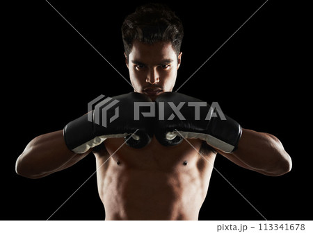 Portrait, man and boxer in stance for training, sports or workout for body health isolated on black background in studio. Fighter, serious face and athlete in gloves for fitness or exercise in Brazil 113341678
