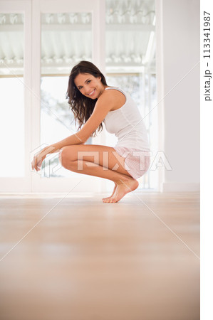 Morning, relax or portrait of happy woman in home for resting in bedroom pyjamas on ground the alone. Mockup space, peace or female person on break or floor with smile ready to start day for wellness Morning, relax or portrait of happy woman in home for resting in bedroom pyjamas on ground the alone. Mockup space, peace or female person on break or floor with smile ready to start day for wellness 113341987