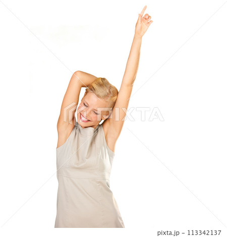 Happy, dance and woman winning in studio for celebration, success and achievement or freedom. Young winner, person or model with energy, excited and yes for news or announcement on a white background 113342137