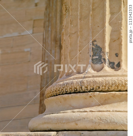 Greek history, ancient pillar or closeup of keystone arch, architectural detail for tourist attraction site. Background, outdoor or stone columns of temple building for culture in Acropolis, Greece Greek history, ancient pillar or closeup of keystone arch, architectural detail for tourist attraction site. Background, outdoor or stone columns of temple building for culture in Acropolis, Greece 113342333