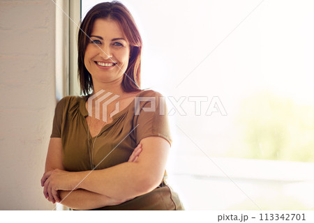 Woman, portrait and relax in home on weekend, smile and comfortable or happy in living room. Female person, confident and positive attitude or satisfaction, mockup space and morning in apartment 113342701