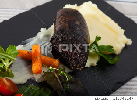 Black pudding with rice Black pudding with rice 113343147