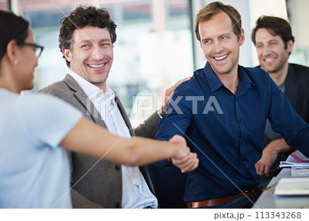 Business people, team and handshake for greeting in office, partnership and b2b connection for deal. Colleagues, hr and networking for recruitment, meeting and onboarding in interview for opportunity Business people, team and handshake for greeting in office, partnership and b2b connection for deal. Colleagues, hr and networking for recruitment, meeting and onboarding in interview for opportunity 113343268