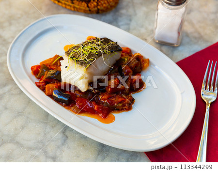 Popular dish of Spanish cuisine is Bacala 113344299