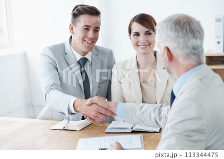 Shaking hands, happy business people or deal for partnership agreement or b2b offer in meeting. Handshake, smile or excited corporate lawyers in collaboration for teamwork with contract or paperwork Shaking hands, happy business people or deal for partnership agreement or b2b offer in meeting. Handshake, smile or excited corporate lawyers in collaboration for teamwork with contract or paperwork 113344475