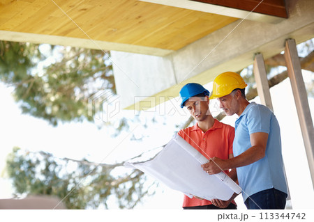 Blueprint, construction and architect with man on site for inspection, project management and planning. Professional contractor, engineer or developer with floor plan, pointing and building design 113344742