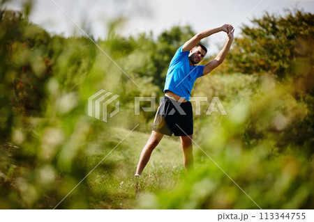 Man, stretching and nature for warm up and exercise for fitness, body health and physical training. Male person or athlete and workout for cardio, active strength or healthy recreation outside Man, stretching and nature for warm up and exercise for fitness, body health and physical training. Male person or athlete and workout for cardio, active strength or healthy recreation outside 113344755
