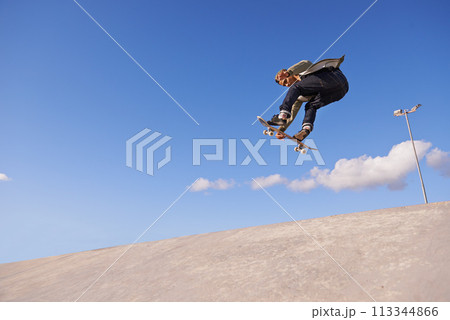 Skateboard, blue sky and man with ramp, fitness and training for a competition and sunshine. Adventure, person and skater with practice for technique and skating style with exercise, energy or cardio Skateboard, blue sky and man with ramp, fitness and training for a competition and sunshine. Adventure, person and skater with practice for technique and skating style with exercise, energy or cardio 113344866
