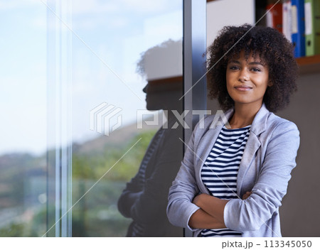 Office, portrait and confident businesswoman with smile, pride and professional at window. Balcony, business and happy woman with arms crossed for fresh air, startup and entrepreneur at workplace 113345050