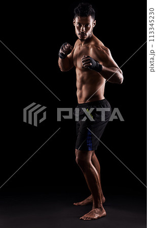 Man, boxer and portrait in studio for sports, fitness and warrior training on black background. Person, athlete and strong muscles for workout or exercise, health and ready for battle or competition 113345230