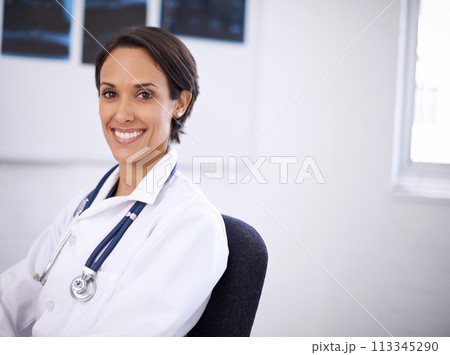 Portrait, doctor and happy woman in hospital for healthcare, wellness or service of surgeon in Brazil. Face, medical professional or smile of employee, worker or radiology expert in clinic for career 113345290