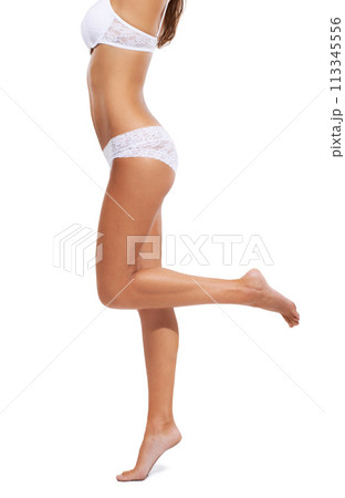 Woman, butt and legs in underwear and lingerie with confidence, pride and fashion on white background in studio. Bikini, panties and model walking or stretching in mockup space with sexy style 113345556