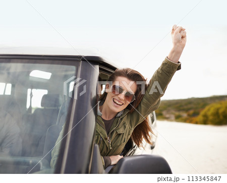 Woman, excited or window in success on road trip or getaway for travel and leisure in Mexico. Car, female person or traveler for fist on driving holiday in motor transport as journey of exploration 113345847