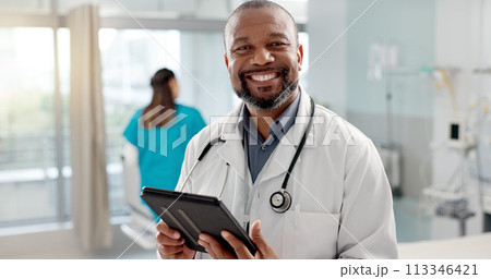 Hospital, face and black man with a tablet, doctor and typing with website info, internet and consultant. African person, portrait and medical professional with tech, clinic and research with email 113346421