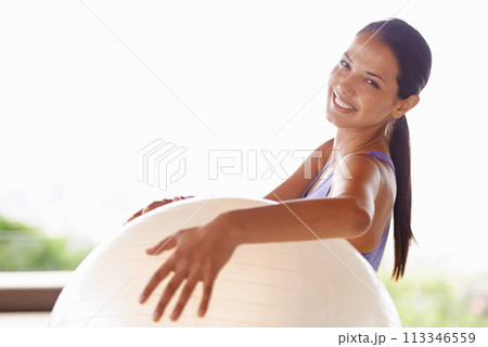 Happy woman, portrait and fitness with exercise ball for workout in health and wellness at home. Face of female person or yogi with smile for gym equipment, training or pilates on outdoor balcony 113346559