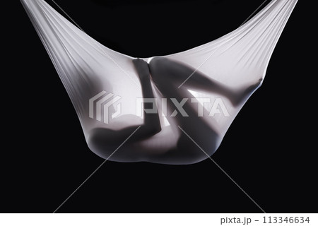 Person, fabric and wrapped naked in studio, abstract and creative art on black background. Woman, girl and material for ethereal or phantom ghost, bare and nude in sheet for fetus illusion in cloth Person, fabric and wrapped naked in studio, abstract and creative art on black background. Woman, girl and material for ethereal or phantom ghost, bare and nude in sheet for fetus illusion in cloth 113346634