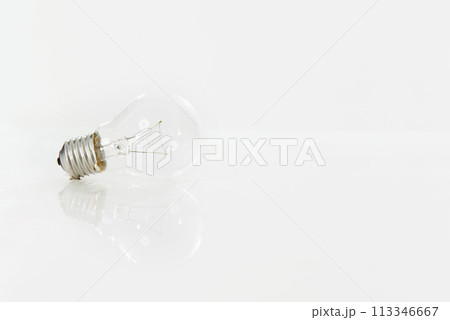 Lightbulb, electricity and energy for light, power and glass on white background isolated. Ideas, thinking and solution for abstract with base cap, screw in and voltage for lighting equipment Lightbulb, electricity and energy for light, power and glass on white background isolated. Ideas, thinking and solution for abstract with base cap, screw in and voltage for lighting equipment 113346667