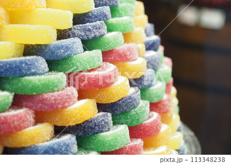 sugar coated jelly beans in the form of colored sliced fruit 113348238
